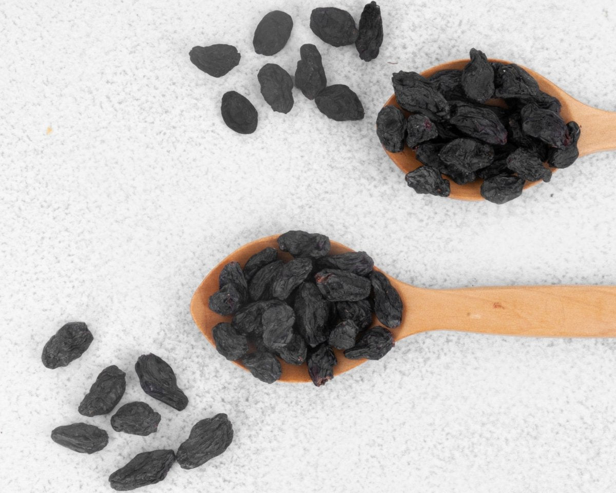 Schwarze getrocknete Rosinen mit Kernen 300 gr - Naturdeluxe